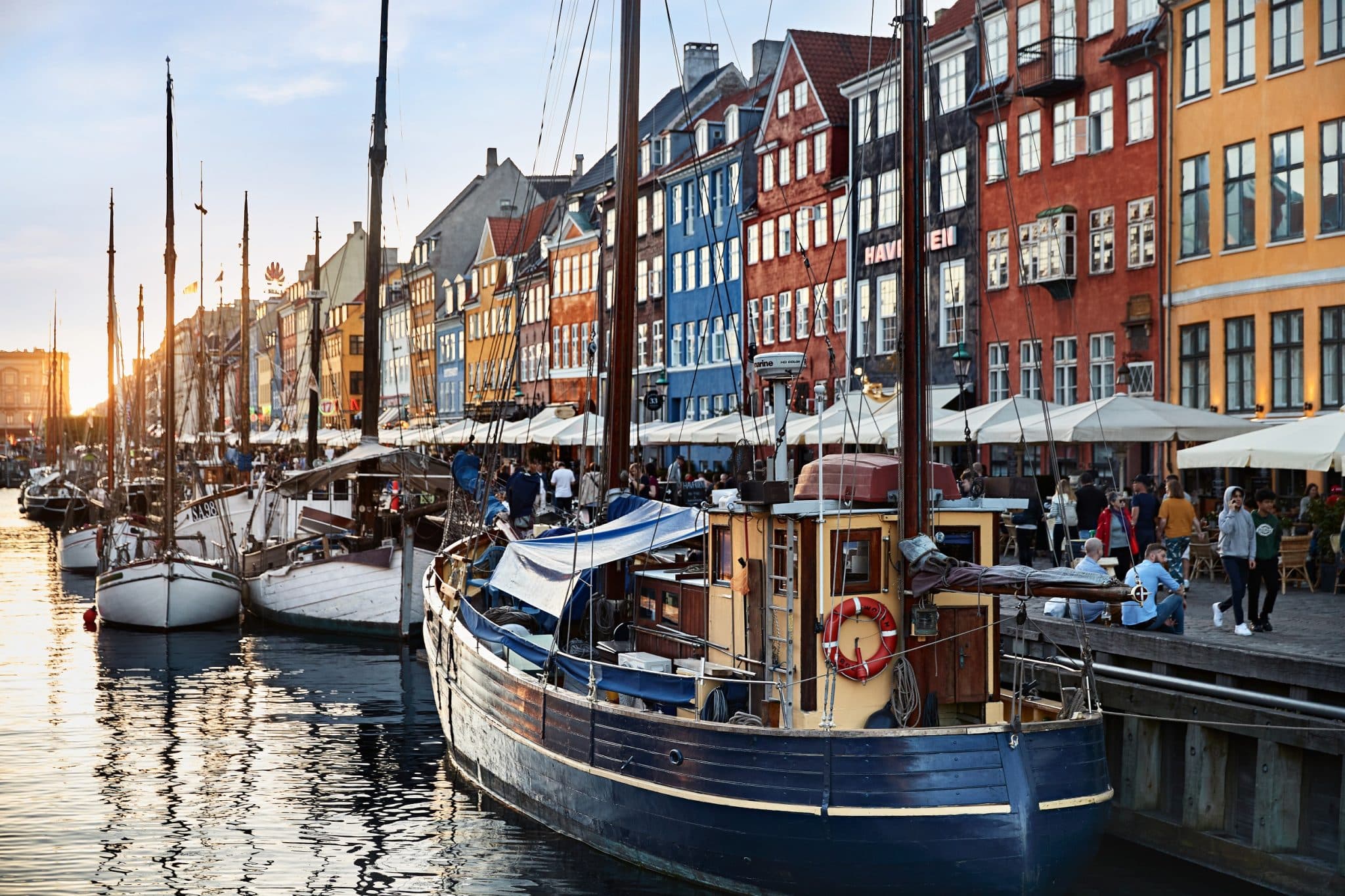 A baltic cruise in the summer showing copenhagen houses along port