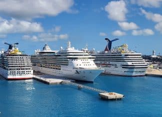Carnival and Royal Caribbean cruise ships in port in Nassau, Bahamas