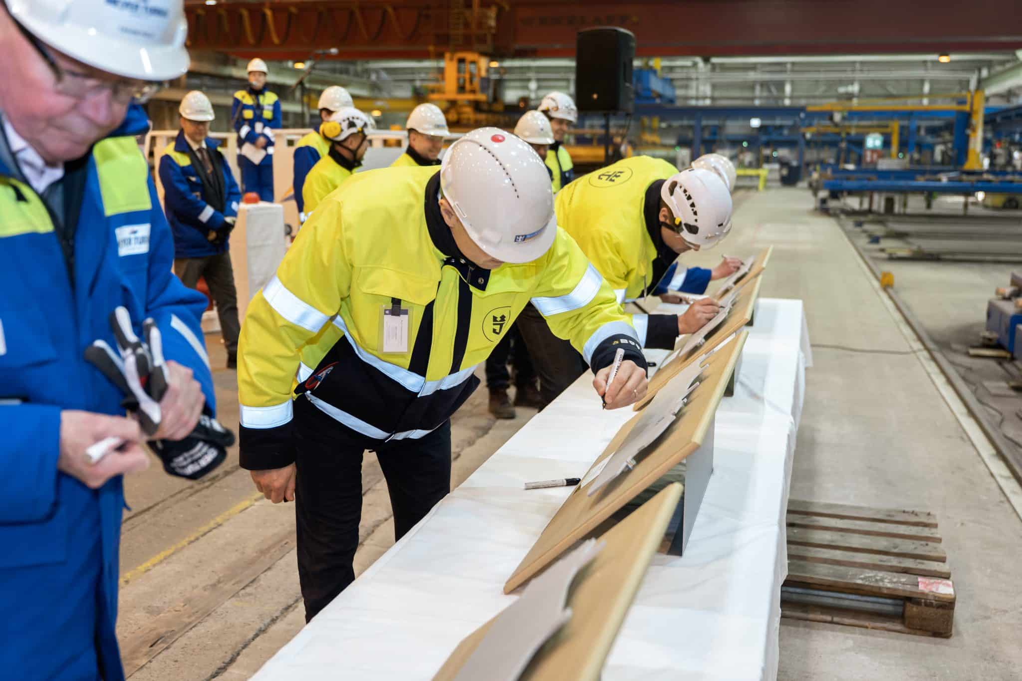 shipyard builders sign the steel cut for the next Icon class ship