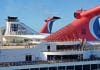 Carnival cruise ships and Royal Caribbean ships docked next to each other