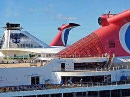 Carnival cruise ships and Royal Caribbean ships docked next to each other