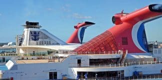 Carnival cruise ships and Royal Caribbean ships docked next to each other
