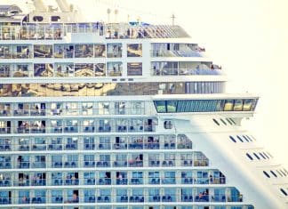 Norwegian cruise ship showing balcony cabins and passengers