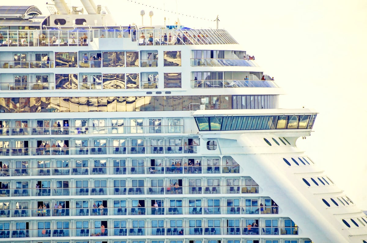 Norwegian cruise ship showing balcony cabins and passengers 