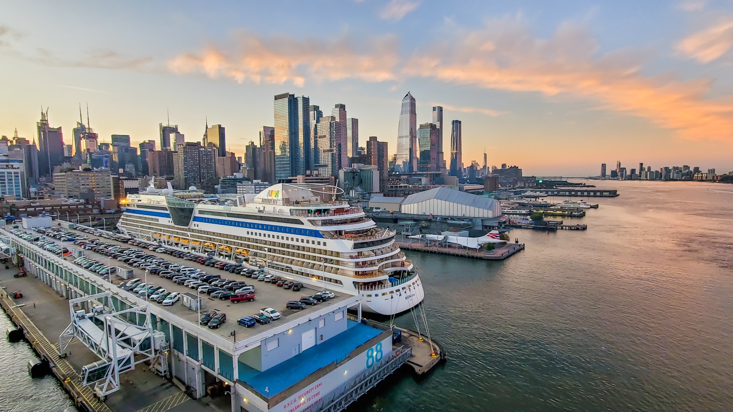 New York City skyline and Manhattan cruise terminal with cruise ship