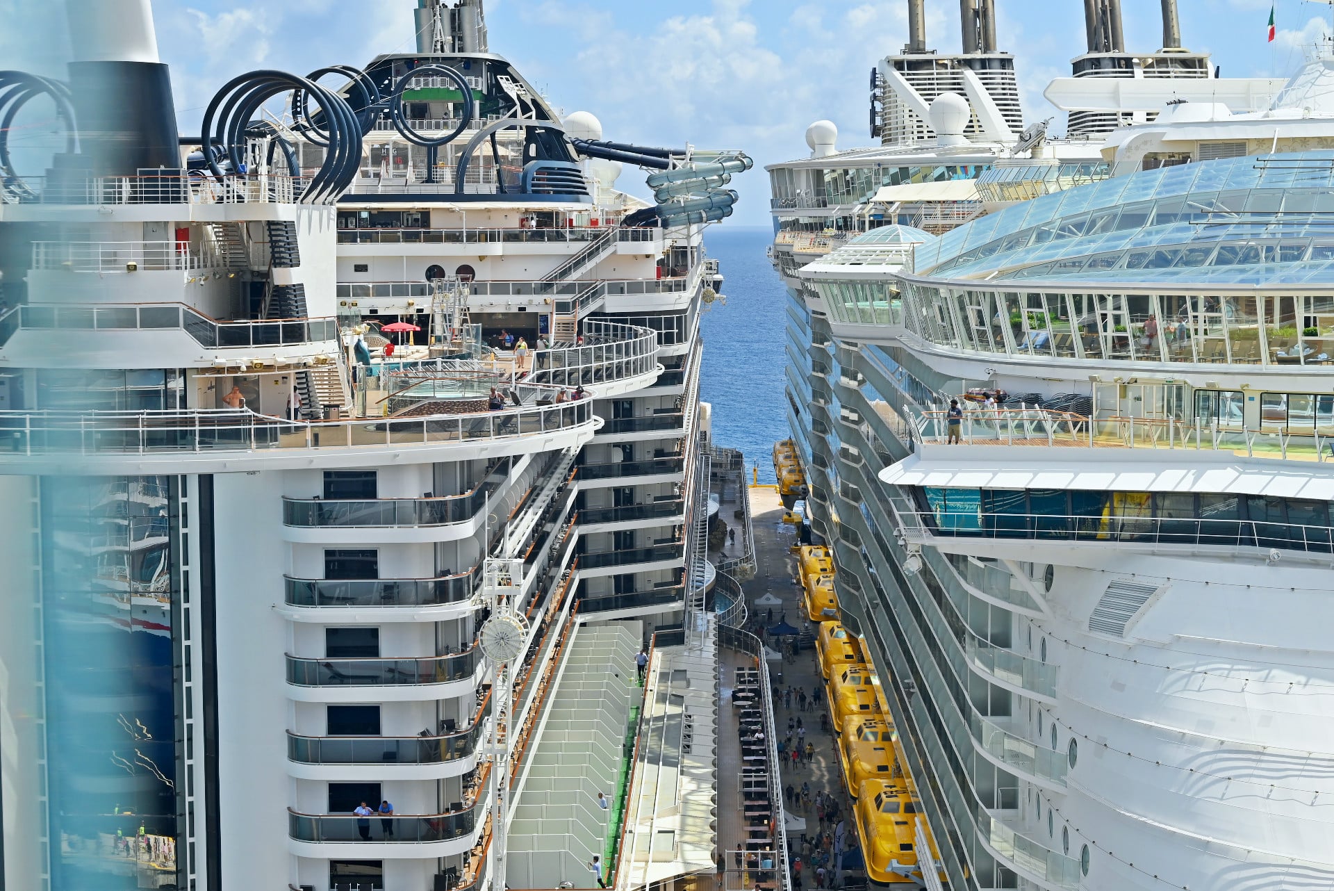 Two cruise ships, MSC Seaside and Allure of the Seas in cruise port