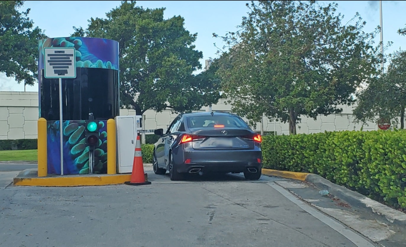 Car paying for parking at Portmiami
