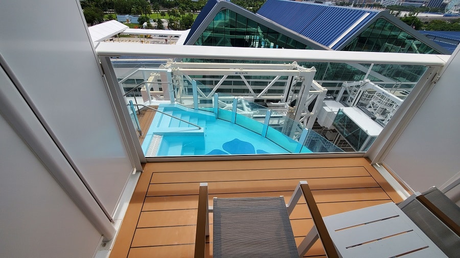 pool below balcony cabin on Carnival Celebration