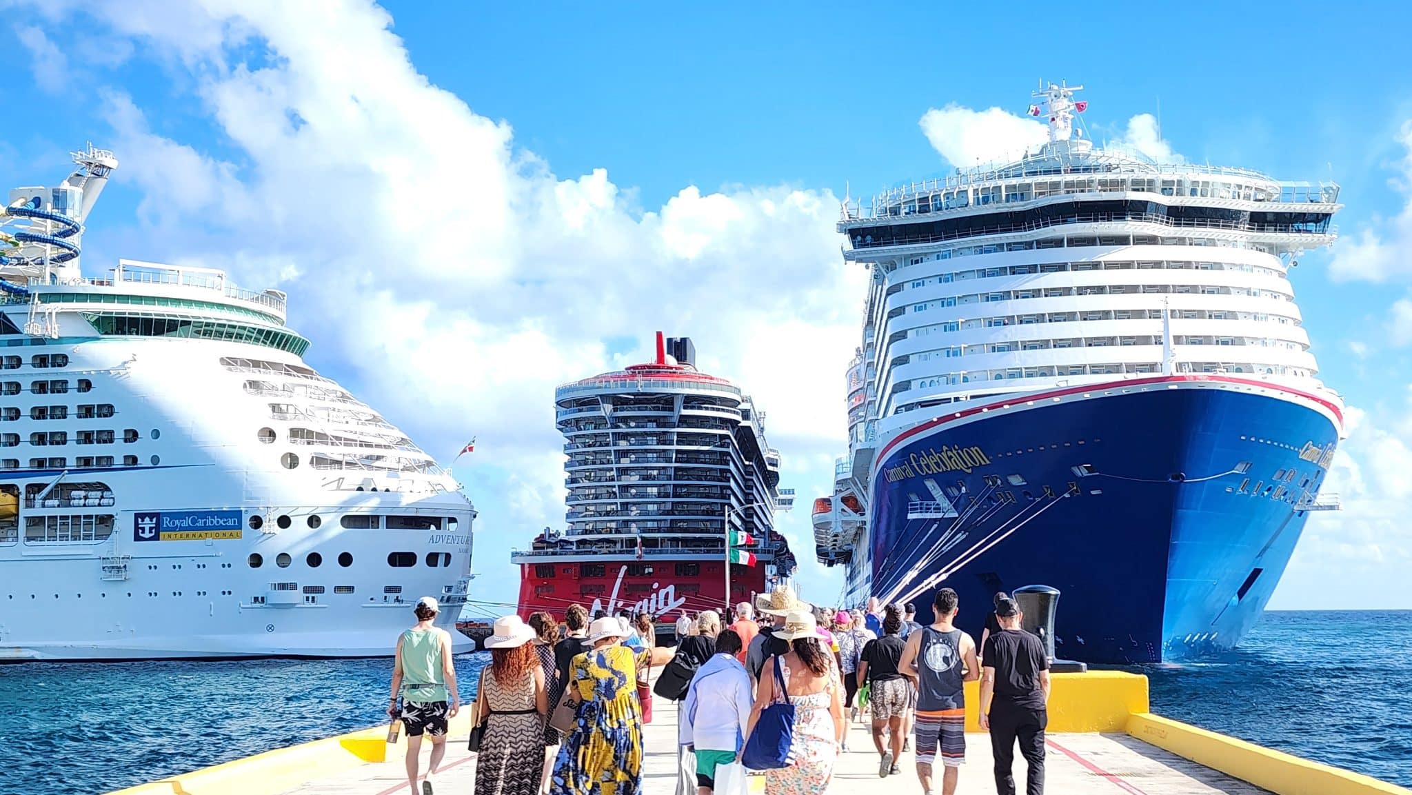 Cruise ships from Royal Caribbean, Virgin, and Carnival Cruise Line in port in Mexico
