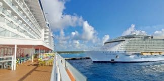 Royal Caribbean's Allure of the Seas in Port next to Carnival Celebration in Cozumel