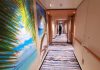 Carnival hallway with crew member cabin steward