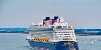 Disney Dream cruise ship sailing out of port
