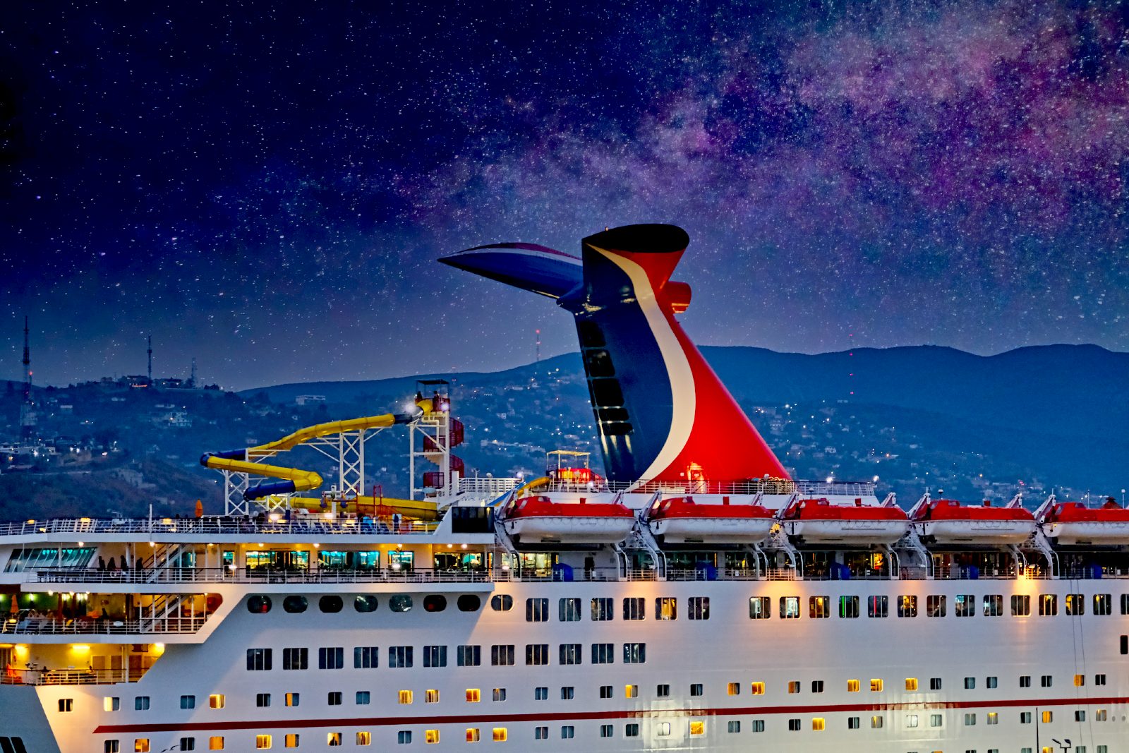Carnival cruise ship at night