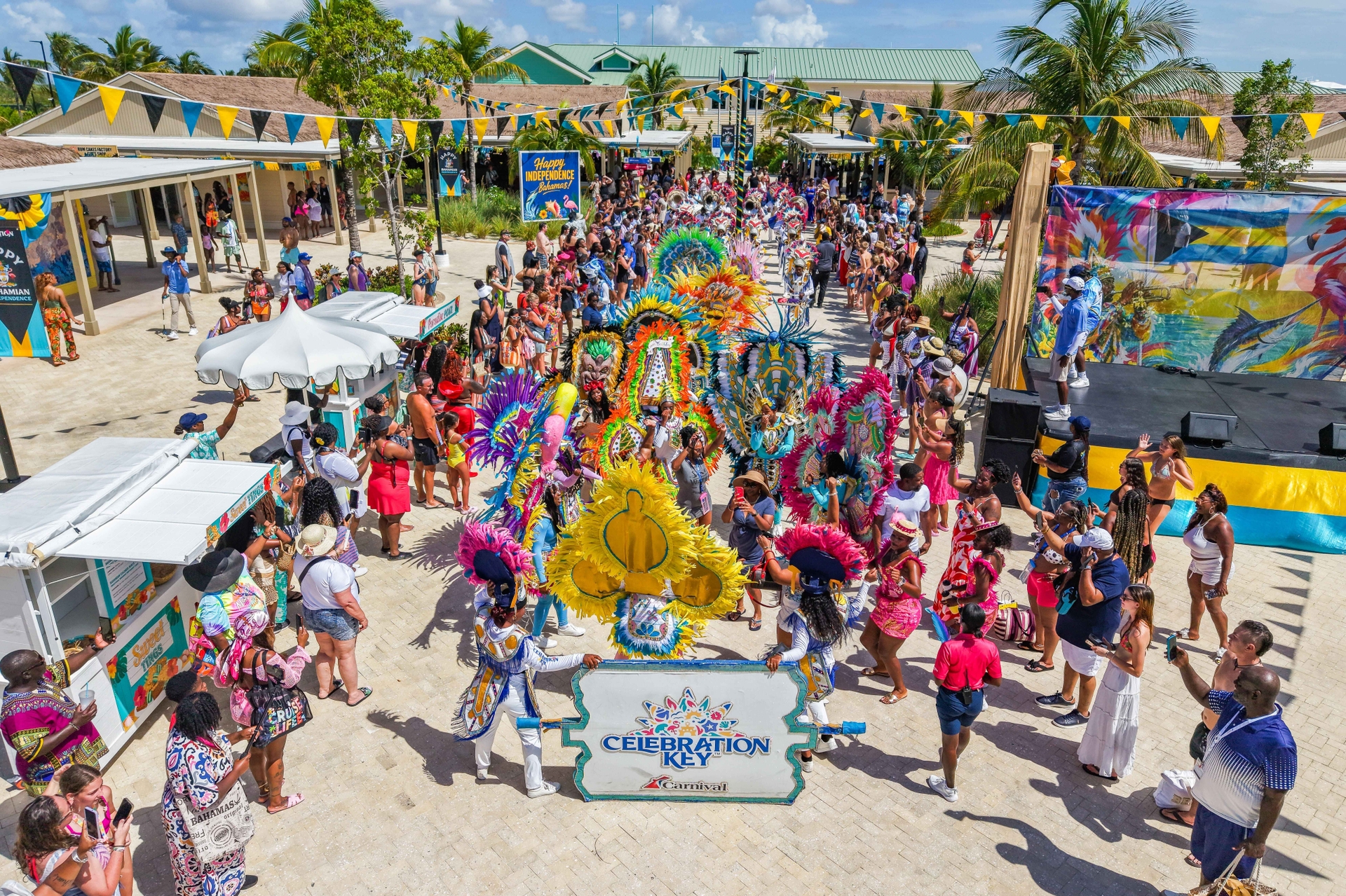 Guests greeted with birthday inspired Junkanoo performance as they arrive to Celebration Key on the destination’s first birthday.