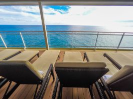 Padded loungers on cruise ship near spa