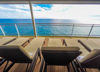 Padded loungers on cruise ship near spa