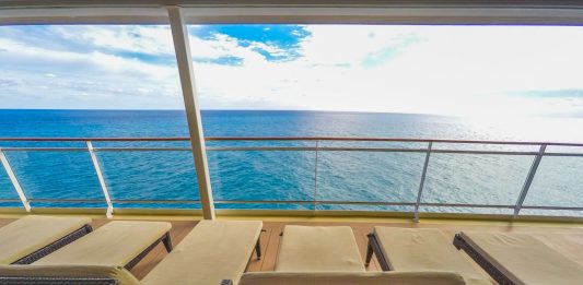 Padded loungers on cruise ship near spa