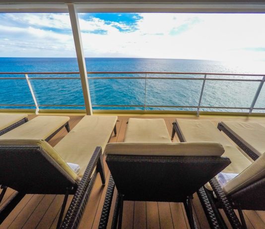 Padded loungers on cruise ship near spa